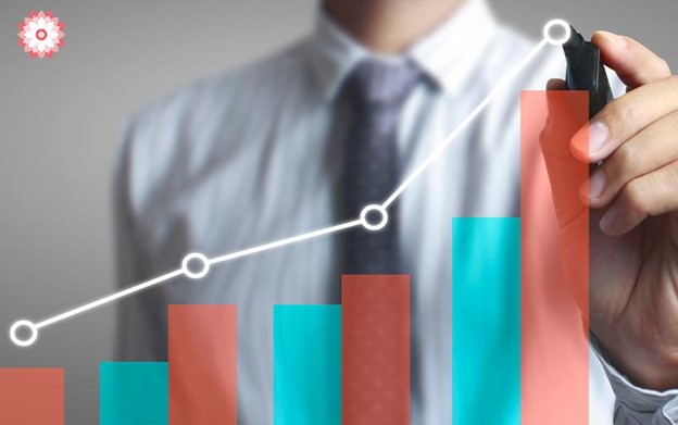 Hand drawing a stock growth chart or graph